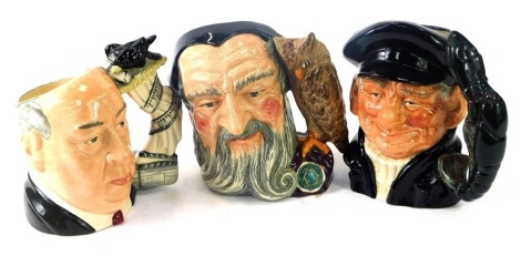 Three large Royal Doulton character jugs, comprising Merlin D6529, Alfred Hitchcock D6987, and Lobster Man D6617. (3)