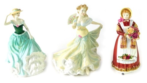 Three Royal Doulton figures, comprising Old Country Roses HN3692, Millennium Celebration HN4201, and Emily HN4093, boxed. (3)