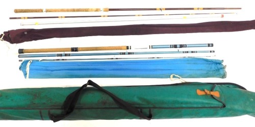 Various fishing rods, split cane rod, steel rods, poles, blue fibre glass rod, etc. All enclosed in a green fishing bag.