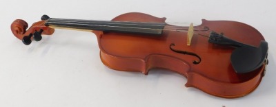 A Windsor two piece back violin, bearing Windsor label, and bow, in a material carry case, 57cm long. - 2