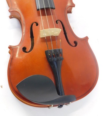 A Windsor two piece back violin, bearing Windsor label, and bow, in a material carry case, 57cm long. - 3