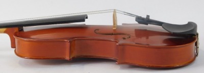 A Windsor two piece back violin, bearing Windsor label, and bow, in a material carry case, 57cm long. - 5