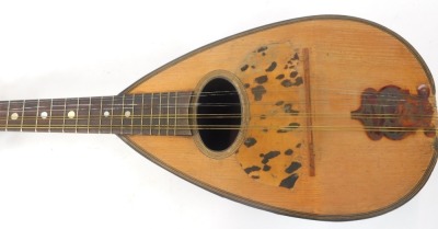 A mandolin, striped ebony casing with bone tuning keys, and tortoiseshell applied crest, in material travel case, 61cm high. - 4