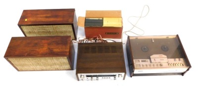 A Sony FM Stereo FM/AM receiver STR7015, a Philips Stereo four track, various tapes and two speakers.