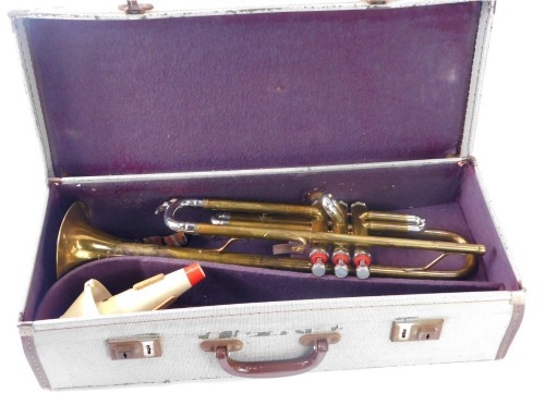 A Boosey & Hawkes brass trumpet, two mouth pieces and a mute, in travel case.