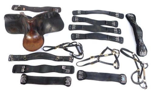 Leather horse tack and equipment, comprising a horse riding saddle and various girths (1 box)