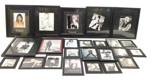 A group of framed celebrity photographs, some bearing signatures, to include Liz Hurley, Adam West, etc, all framed and glaze. (a quantity)