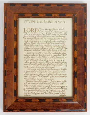 A copy of The Lords Prayer, enclosed in a parquetry banded boxwood and riveted frame, 33cm x 25cm.