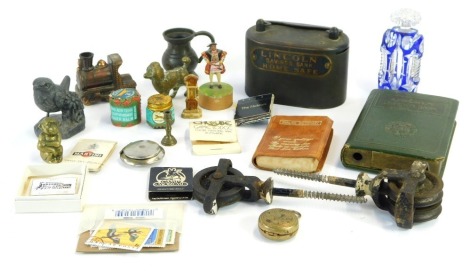 A group of trinkets, comprising a Lincoln Savings Bank home safe, miniature pewter tankard, blue and cut glass scent bottle, brass poodle, Wade Whimsie, match cases, English Dictionary, Lincoln Savings Bank bank, etc. (a quantity)