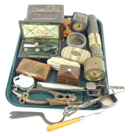 A group of Edwardian and later trinkets and accessories, comprising mahogany cased sewing kit, nut crackers, padlocks, scissors, travel clock, two draw telescope, inlaid box, etc. (1 tray)