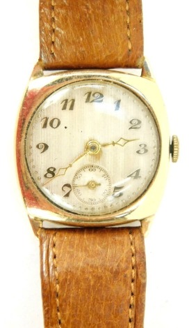 A 9ct gold cased gentleman's wristwatch, the square set dial with silvered numeric dial and seconds counter, 2cm wide, on a tan leather strap, 18.3g all in.