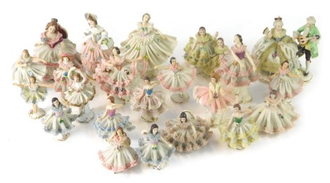 A group of Dresden porcelain crinoline figures, AF. (a quantity)