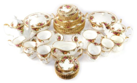 A Royal Albert Old Country Roses pattern part tea and dinner service, Comprising two tureens, two cake plates, eight bread plates, eight dinner plates, teapot, coffee pot, two milk jugs, two sugar bowls, gravy boat and saucer, four pin dishes, various pin