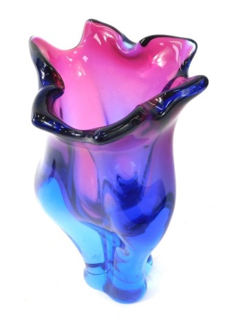 A Czech glass vase, with layered purple and blue colouring with flared rim, 24cm high.