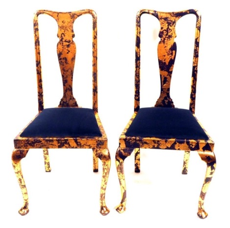 A pair of 20thC dining chairs, each painted with blue and rose gold, with blue velvet seats, 107cm high, 47cm wide, 43cm deep.