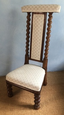 A Victorian elm Prie Dieu chair, with barley twist supports, 103cm high.