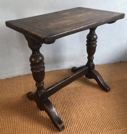 A Jacobean style oak table, with baluster supports and shaped feet, 70cm high, 70cm.wide, 46cm deep.