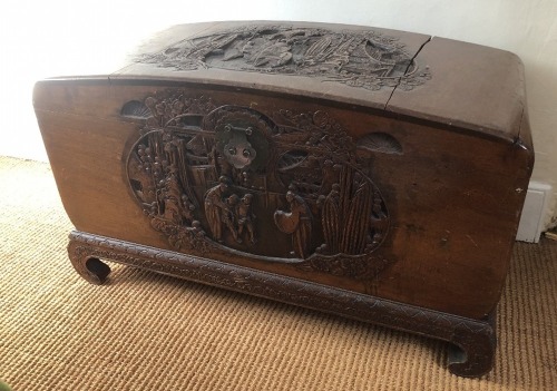 An early 20thC carved camphor wood blanket chest, 55cm high, 92cm wide, 47cm deep.