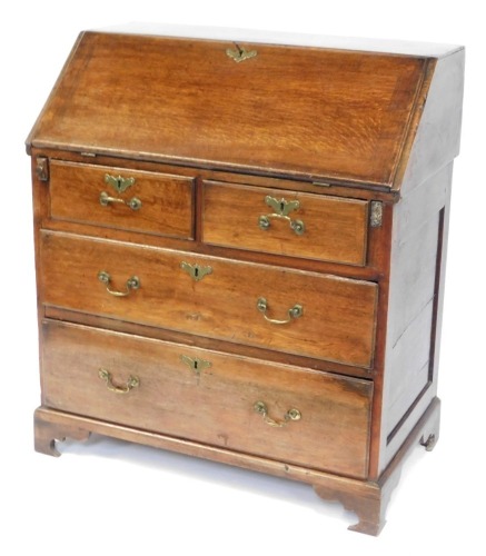 An early 19thC oak bureau, the fall above one short and two long drawers, on bracket feet, 98cm high, 86cm, wide, 48cm deep. (AF)