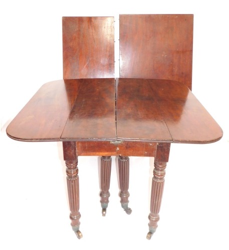 A George IV mahogany extending dining table, in the Gillows manner, with eight reeded legs with brass cup castors, 132cm wide, 130cm minimum length, plus a single extension leaf of 79cm. To be sold WITHOUT RESERVE.