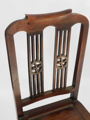 A Chinese hardwood chair, with pierced splat back with Buddhistic symbols, on shaped legs, 98cm high. - 2