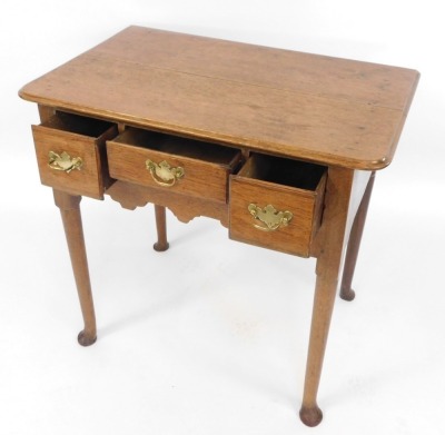 An 18thC oak lowboy, with an arrangement two short and one long drawer, on tapered legs with pad feet, 71cm high, 72cm wide, 49cm deep. - 2