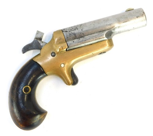 A 19thC Colt military single shot pocket pistol, 12.5cm long.