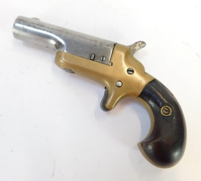 A 19thC Colt military single shot pocket pistol, 12.5cm long. - 2