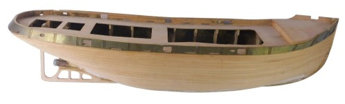 A matchstick boat, with moulded base and brass edge,18cm high, 83cm wide.