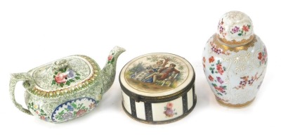 A Samson porcelain jar and cover, with hand painted rose decoration, 14cm high, a Copeland's leadless glaze miniature teapot, 9cm high, and a Continental trinket box, with filigree brass detail, 10cm diameter. (3)