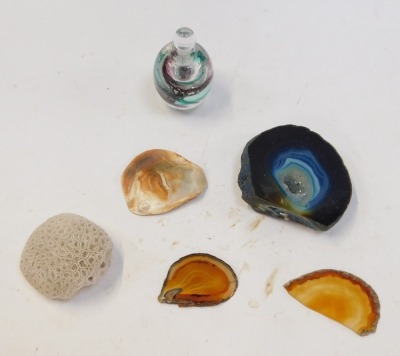 A group of crystals and glassware, comprising an ammonite shell, a blue geode, various agate slices, and a green and pink swirl art glass bottle and stopper. (6) - 2