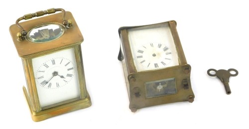 Two brass carriage clocks, comprising a 20thC brass carriage clock, with white enamel Roman numeric dial, key wind, with swing handle, 10.5cm high, and another sold as parts, (2, AF).