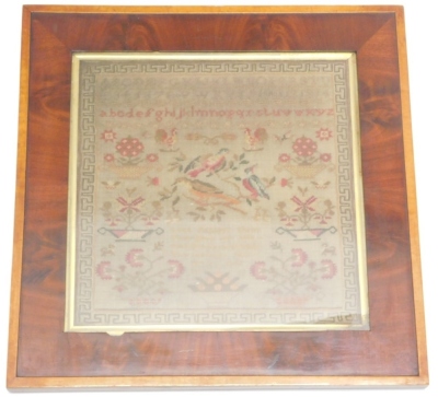 An early Victorian alphabetic pictorial and motto sampler, by Betsy Balls aged eleven years dated 1838, decorated with vases of flowers and birds, with a Greek key border with a flamed mahogany and inlaid frame, the frame 45cm x 44cm. - 2