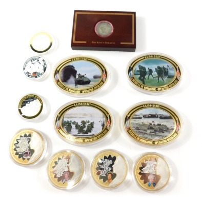 Various plated collectors coins, The Queens Speeches, Defining Moments of WWII, and other part sets, a four medallion set, 17th Anniversary of D-Day, limited edition, and a cased Kings shilling 1944. (3 cases)