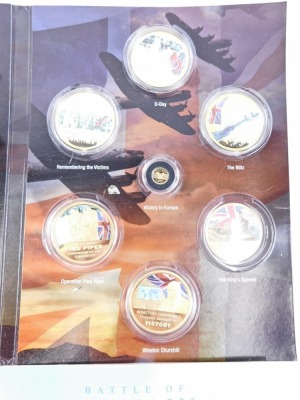 A Battle Of Britain aircraft limited edition Douglas Bader gold plated coin set, in outer packaging, and Remembering World War II, coin set, including gold plated and other coins. (a quantity) - 3