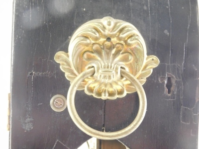 Banister, Colchester. An early 19thC ebony and brass inlaid lancet shaped mantel clock, decorated with scroll, roundels, etc., the painted dial with Roman numerals, the brass movement also engraved with the maker, 46cm high. James Banister is recorded as - 3