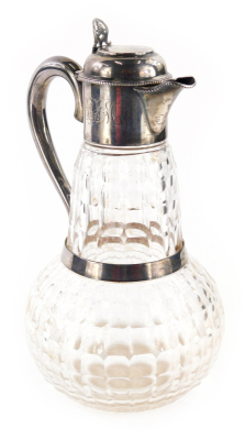 A Victorian silver and cut glass claret jug, with compressed domed lid, thumb mould handle, plain S scroll handle and banding and shaped mallet body, with bead work outline to the lipped spout, Sheffield 1888, 27cm high.