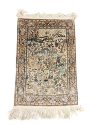 A Chinese embroidery silk work, set with many figures and animals, on a naturalistic setting, with a floral outline with tasselled edge, 42cm x 31cm, on an embroidered back.