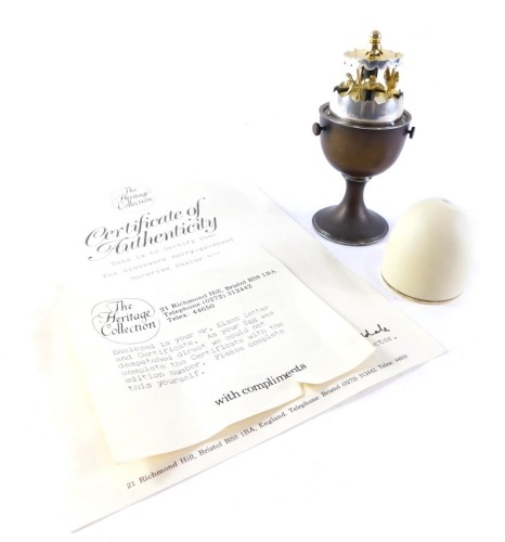 A Elizabeth II novelty silver Surprise Egg, by Anthony Gordon Elson, opening to reveal a miniature carousel egg timer, London 1980, with Heritage Collection certificate, 10cm high, 6.5oz all in.