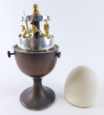 A Elizabeth II novelty silver Surprise Egg, by Anthony Gordon Elson, opening to reveal a miniature carousel egg timer, London 1980, with Heritage Collection certificate, 10cm high, 6.5oz all in. - 2