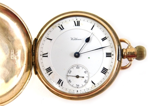 A 20thC 9ct gold cased Hunter pocket watch, with 5cm Roman numeric dial with subsidiary Arabic second hand, in a plain case, marked Waltham.