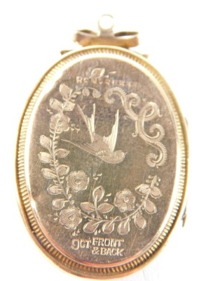 A Victorian sweetheart locket, with bow design top, with swallow and floral swag, marked 9ct gold back, 3cm x 2cm. - 2