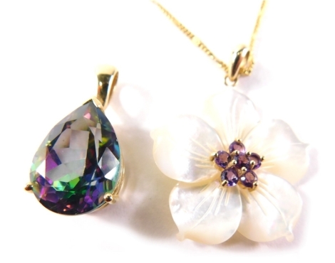 A 9ct gold pendant, with mother of pearl flower set with central amethyst, on a 9ct gold clasp, 3cm high, on a later plated chain, 3.6g and a mystic topaz pendant, in yellow metal clasp stamped 375, 5.8g. (2)