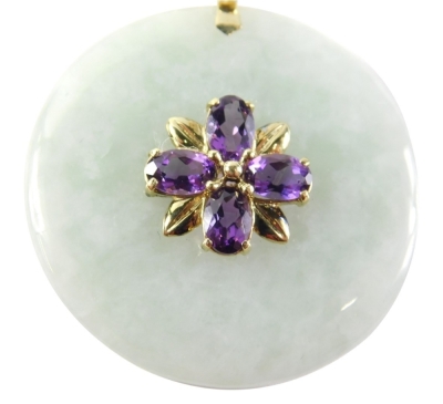 A jade pendant, the circular disc with central oval amethyst cluster, the amethyst setting stamped 585, on a 9ct gold rope twist neck chain, 16cm long, 18g all in.