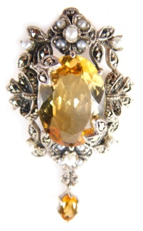 A citrine marcasite and blister pearl pendant, set in white metal stamped 925, 4.5cm high, on a rope twist neck chain marked 925, 16.3g all in. (AF)