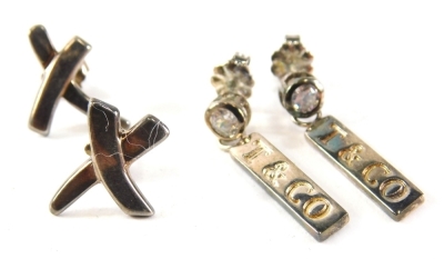 Two pairs of Tiffany & Co earrings, comprising a pair of silver crosses and a pair of silver and cz drops, 6.1g all in. (2)