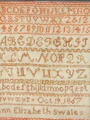 A Victorian alphabetic and numeric sampler by Ann Elizabeth Swales, October 1867, 29cm x 25cm.