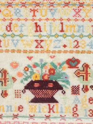 A pictorial alphabetic and numeric sampler Annie Hickling, aged thirteen, 26cm x 23cm.