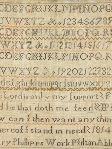 A George III alphabetic, numeric and motto sampler by Mary Phillips, Milton Abbot 1814, 34cm x 31cm.