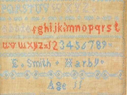 A Victorian alphabetic and numeric sampler by E Smith, aged Eleven, March, 21cm x 23cm.